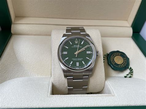 rolex oyster perpetual 126000 - green dial.|rolex 41mm date just mint dial.